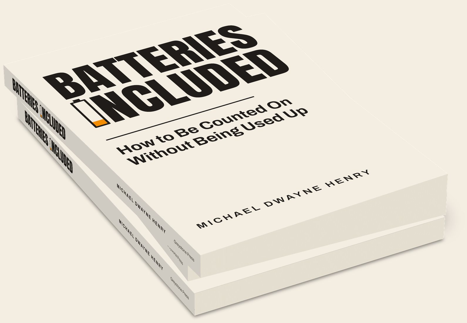 Three paperback copies of Batteries Included in a stack